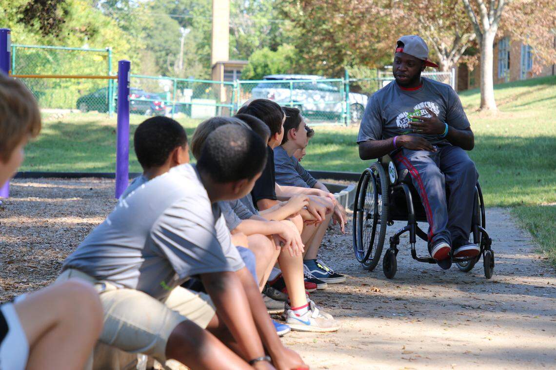 “You can go read books to kids for a half an hour a couple times a week, but I don’t think that that would’ve had the same impact as me encouraging 9-, 10-year-old boys to be great at what they want to do,” says Marcel George, when asked why this particular volunteer opportunity appealed to him.
