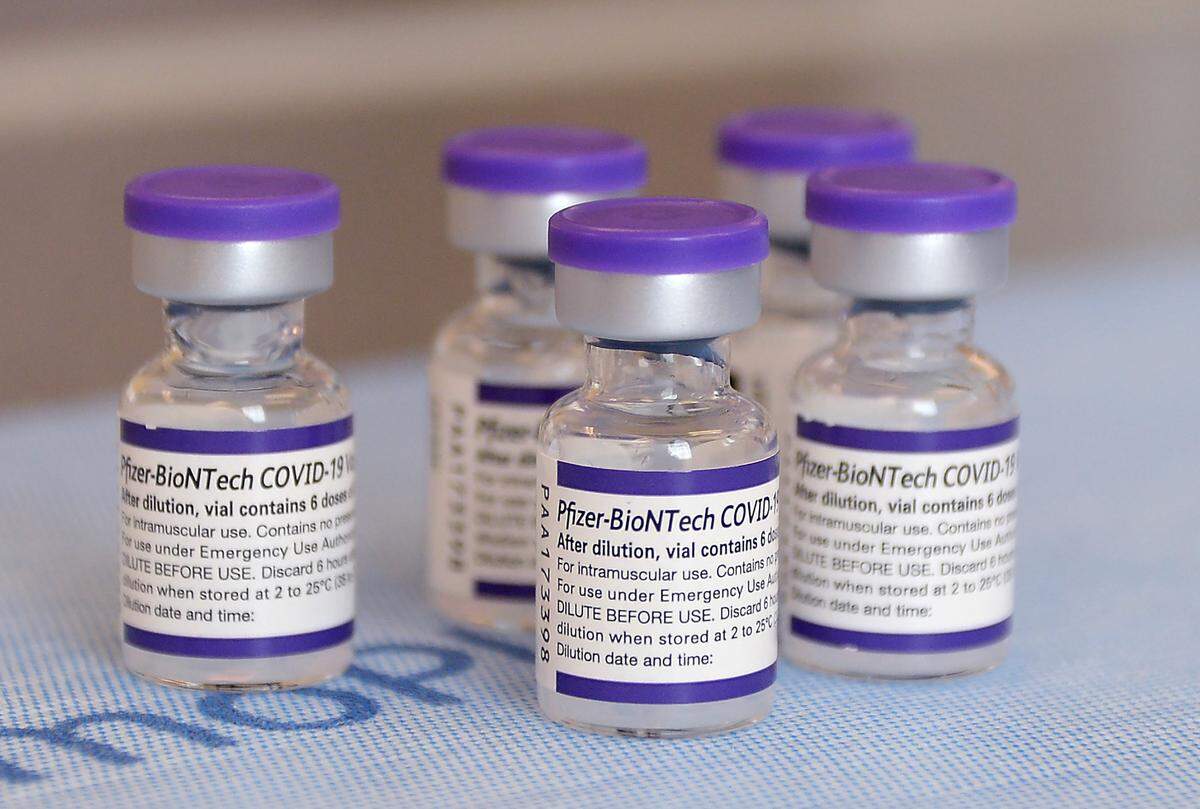 Bottles of Pfizer COVID-19 vaccine are among the varieties available for use on Tuesday, December 7, 2021 at Novant Health at 125 Baldwin Ave. in Charlotte, NC.