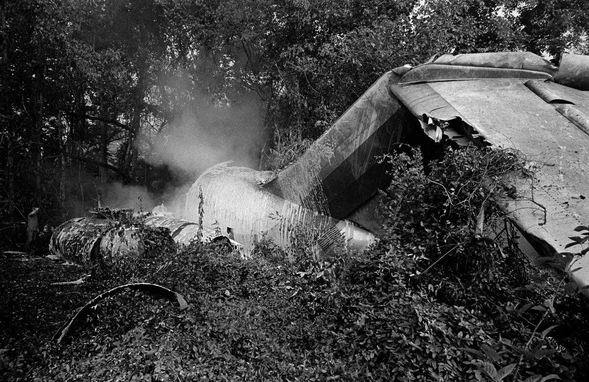 Smoke rises from the wreckage of Eastern Air Lines Flight 212.