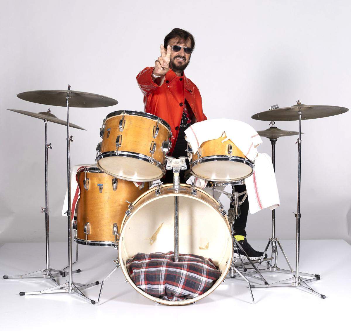 Ringo Starr with the 1967 Ludwig Hollywood drum kit and its thermoglass maple finish. You can see him and the drums in the original “Let It Be” movie of the rooftop concert as well as the “Get Back” documentary, and hear them on the “Let It Be” and “Abbey Road” albums.