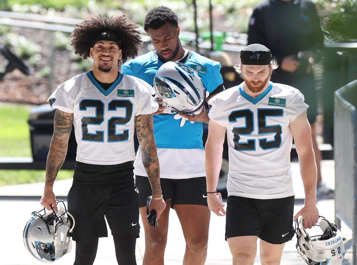 Carolina Panthers rookie safety Lathan Ransom, left and safety Isaac Gifford, right, walk to the team’s rookie minicamp practice on Friday, May 9, 2025.