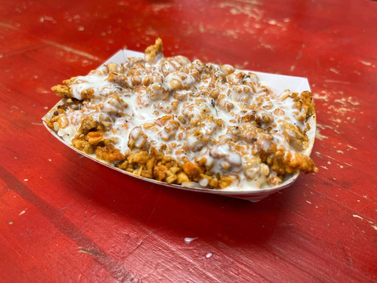 Mix Grill & Wings offers chicken over rice (shown here), along with gyro lamb over rice.