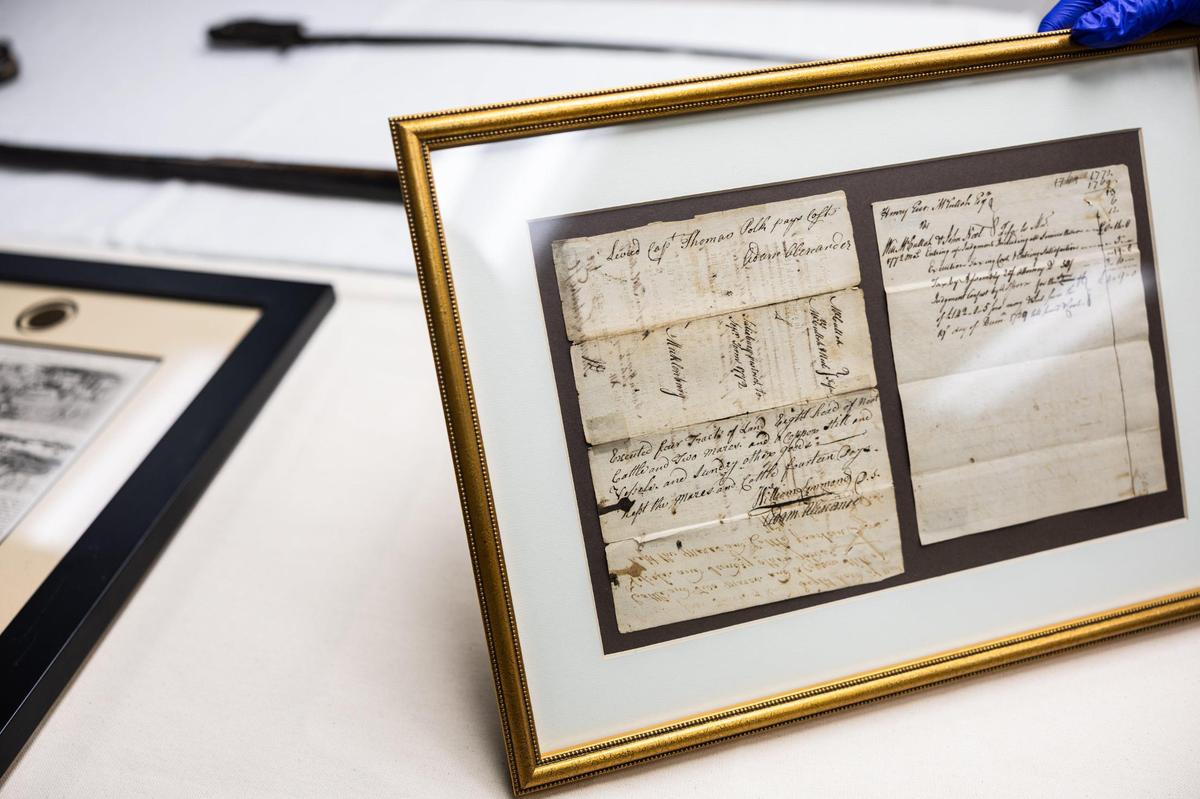 These are deeds signed by Thomas Polk, one of the richest men in Charlotte, who also signed the Meck Dec. It is part of the Charlotte Museum History's exhibit on the 250th anniversary of the Mecklenburg Declaration of Independence. 