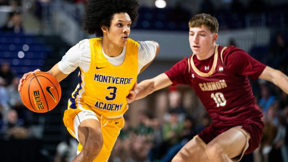 Montverde Academy Eagles guard Curtis Givens (3) handles the ball while being guarded by Cannon School Cougars guard Lincoln Vinson (10) during the first quarter of a game during the 50th annual City of Palms Classic at Suncoast Credit Union Arena in Fort Myers on Monday, Dec. 18, 2023.