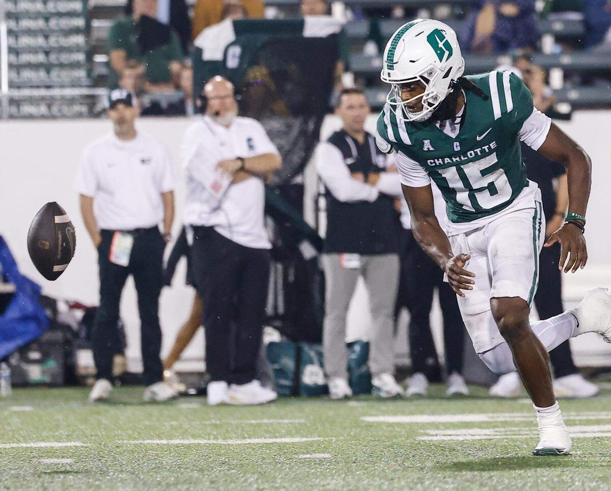 Charlotte quarterback Conner Harrell chases a loose ball after the snap during the game aginst Chapel Hill at Jerry Richardson Stadium on Saturday, September 6, 2025.