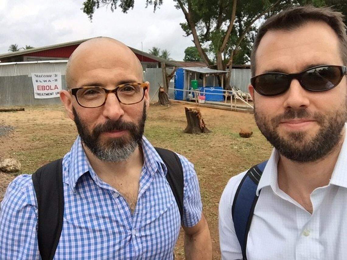 UNC-Chapel Hill doctors David Wohl, left, and William Fischer II at the hospital in Monrovia, Liberia. They were among the infectious disease doctors who answered the World Health Organization’s call to respond to Ebola in Africa. Wohl says much of what he and other doctors learned dealing with infectious diseases in Africa gave them a head start responding to coronavirus at UNC.