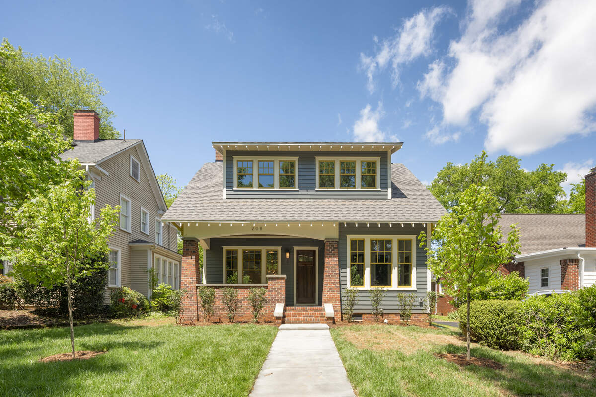 This infill in historic Wesley Heights was designed to closely match its historic neighbors. The exterior was inspired by a 1923 Standard Homes Catalogue.