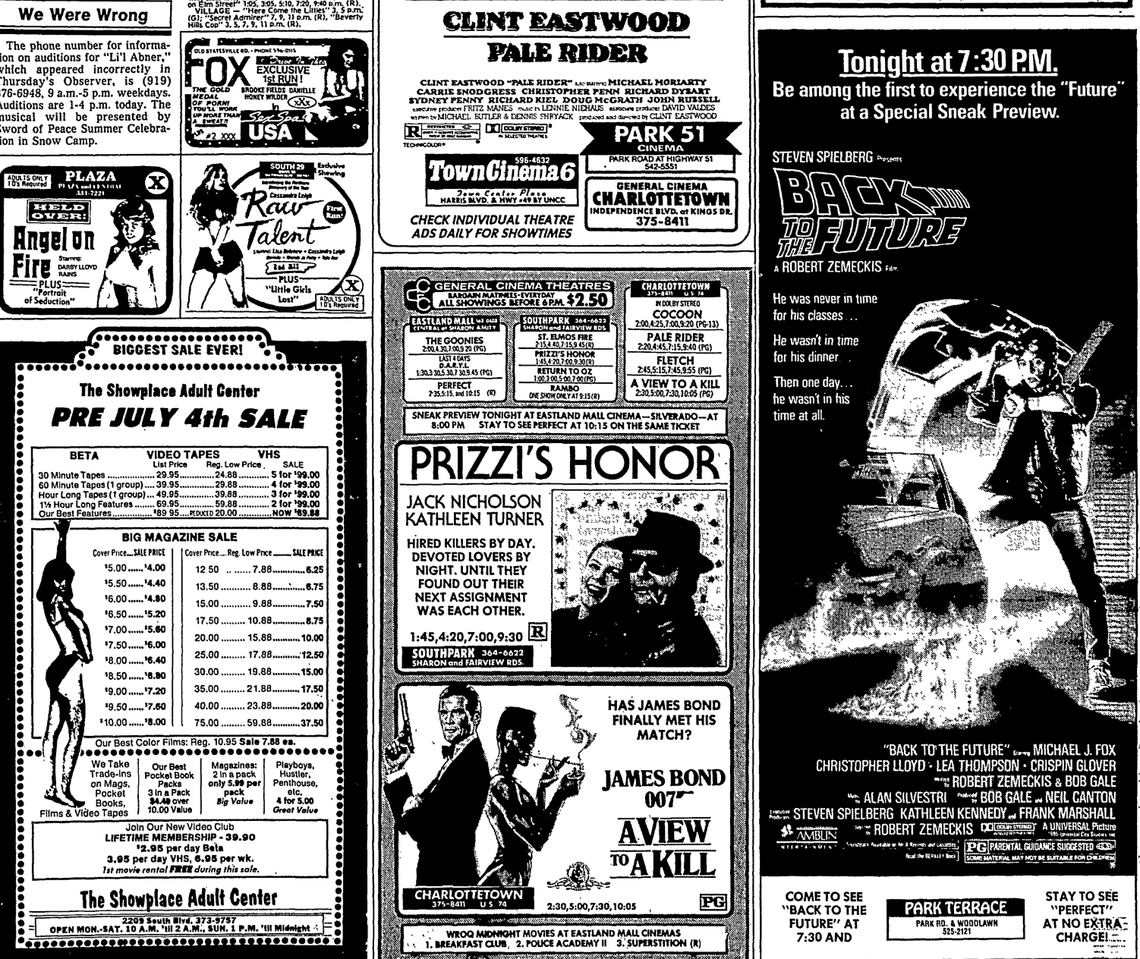 A black and white newspaper page from the 1980s, filled with movie and video store advertisements. The most prominent ad, on the right, is for a “Special Sneak Preview” of “Back to the Future” “Tonight at 7:30 P.M.” at Park Terrace, showing the iconic poster of Marty McFly and the DeLorean. Other movie ads visible include “Clint Eastwood Pale Rider,” “Prizzi’s Honor,” and “James Bond 007 A View to a Kill.” On the left side, a large advertisement for “The Showplace Pre July 4th Sale” lists prices for VHS tapes and video club memberships.