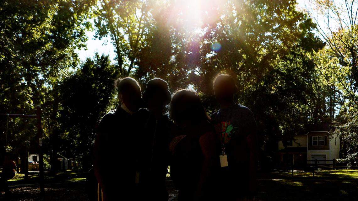 Four survivors of domestic violence stand together Wednesday, October 5, 2022, in Charlotte, NC.