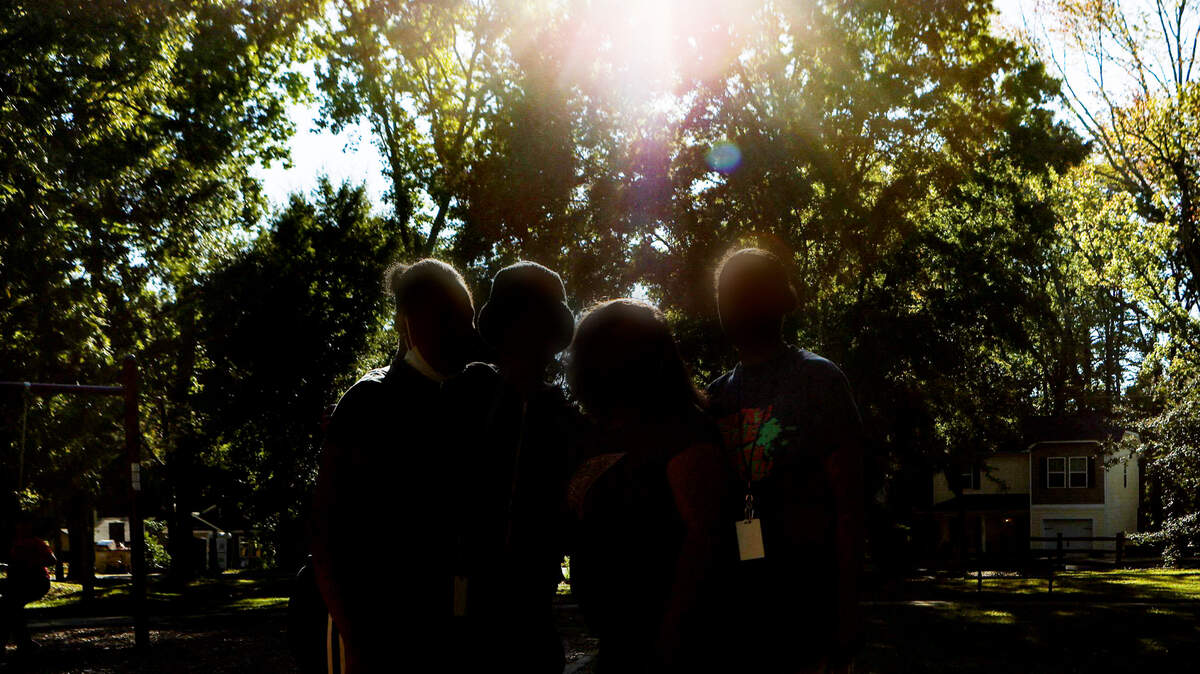 Four survivors of domestic violence stand together Wednesday, October 5, 2022, in Charlotte, NC.
