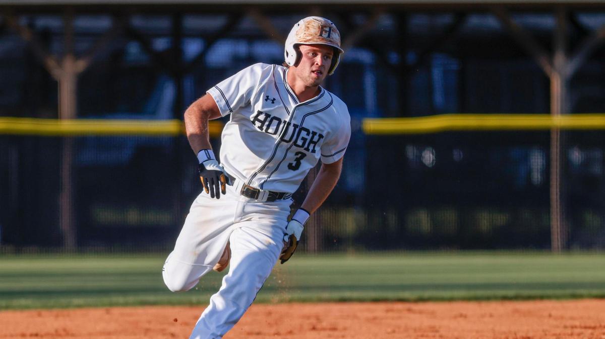 Hough baserunner Aiden Evans rounds third base on his way to scoring a run against Independence in high school baseball action in Cornelius, N.C., Tuesday, April 19, 2022.