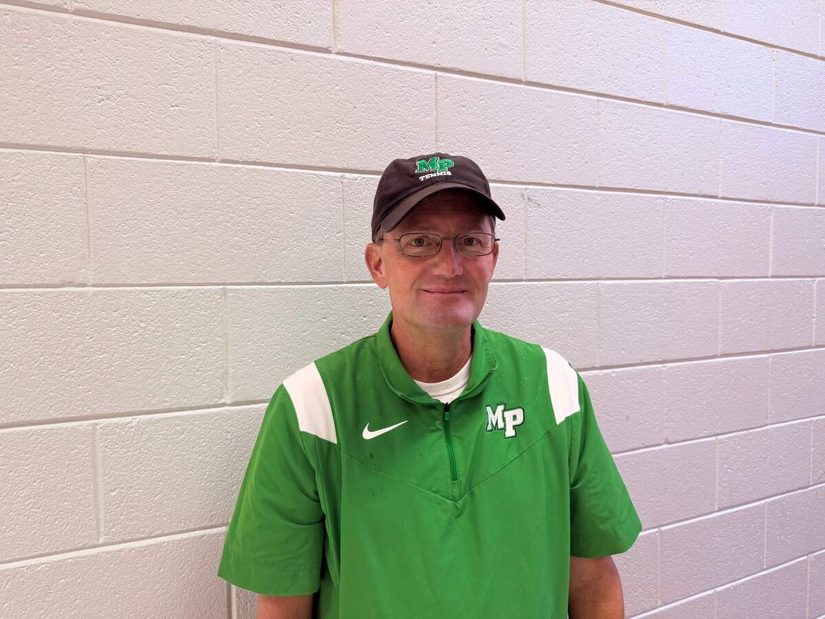 Myers Park tennis coach Ed Flynn