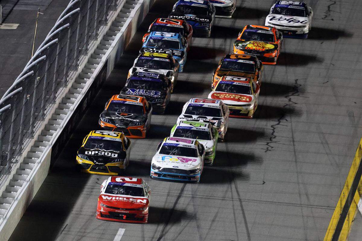 Feb 15, 2025; Daytona Beach, Florida, USA; Xfinity Series driver Jesse Love (2) leads the field during the United Rentals 300 at Daytona International Speedway. Mandatory Credit: Mark J. Rebilas-Imagn Images