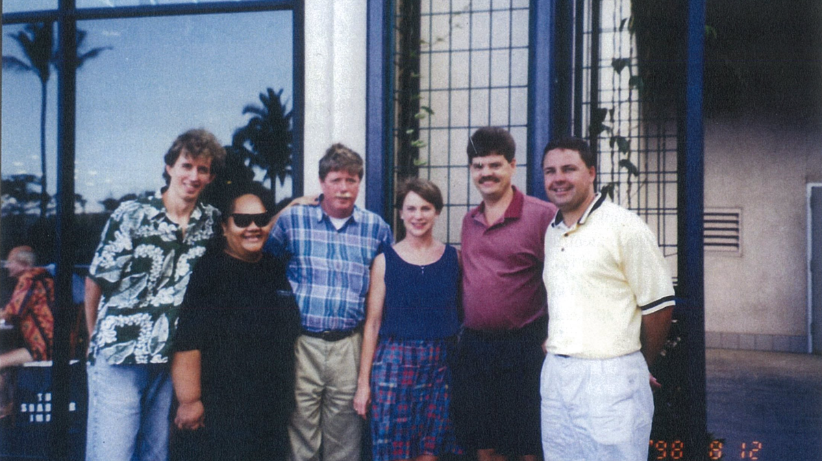 Maui County is gearing up to sue Bank of America for alleged failing to make good on a pledge to lend to native Hawaiians. Bank of America executive Cathy Bessant (third from right) and other bank executives meet with Hawaiian activists Ian Chan Hodges (far left) and Kehau Filimoe’atu (second from left) in 1998 on Maui.