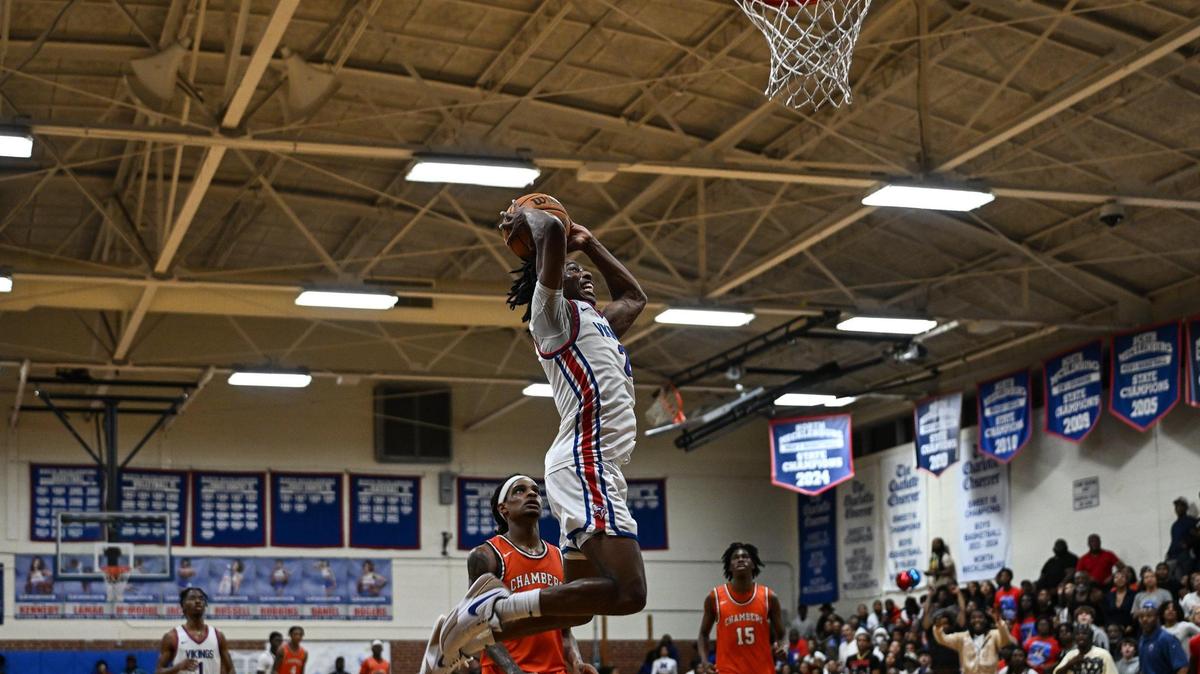 North Mecklenburg’s Carson Evans drives to the basket during the second half of a varsity basketball game against Chambers, Friday, Feb. 7, 2025, in Huntersville, N.C. (Charlotte Observer /Matt Kelley)