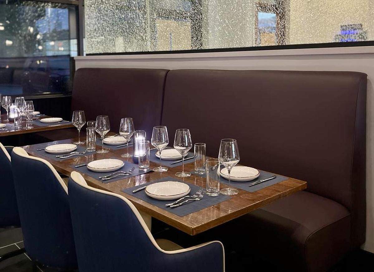 Comfortable seating fills the dining room at 16 Prime Steak & Seafood.