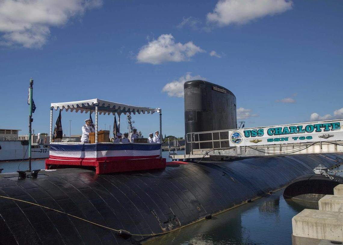 Cmdr. Timothy Yanik delivers remarks during the Los Angeles-class fast-attack submarine USS Charlotte (SSN 766) change of command ceremony in Joint Base Pearl Harbor-Hickam.