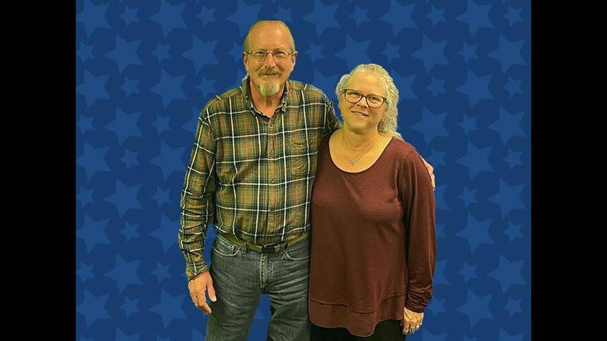 Gregg Hensley let his wife, Vicki, see details about his third major prize for herself.