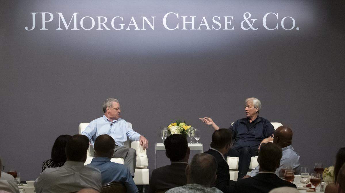 JP Morgan is planning branches for Uptown, Cornelius and the Arboretum shopping center, the first step in a major retail banking expansion in the Charlotte area. Here, Rob Holmes, Head of JP Morgan Corporate Client Banking (left) interviews Jamie Dimon, Chairman and CEO of JPMorgan Chase (right) at a luncheon at the Ritz-Carlton in uptown Charlotte in August.