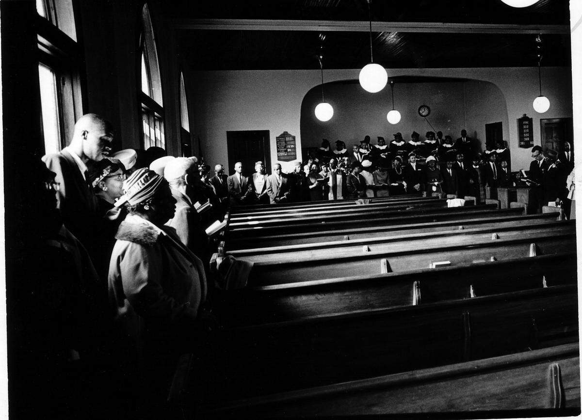 “You have to be willing to be uncomfortable and hear those stories,” says Corine Mack of restorative justice in Charlotte. Photo from Brooklyn neighborhood, Oct. 31, 1965.