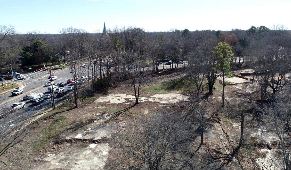 Providence and Fairview Road traffic pass by a vacant piece of property in Charlotte, which was once the Carmel On Providence apartment homes. The land owner said a developer is interested in the site.