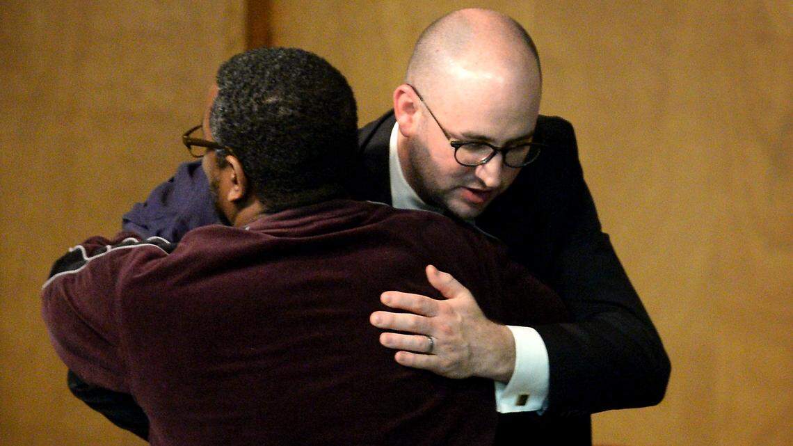 Rev. Benjamin Boswell, right/facing camera, the senior pastor at Myers Park Baptist Church in Charlotte, NC speaks with hugs an attendee of the church’s special series Awakening to Racial Injustice on Wednesday, December 14, 2016. Rev. Boswell was joined by Rev. Dr. Peter Wheery, Senior Minister of Mayfield Memorial Missionary Baptist Church for the discussion.