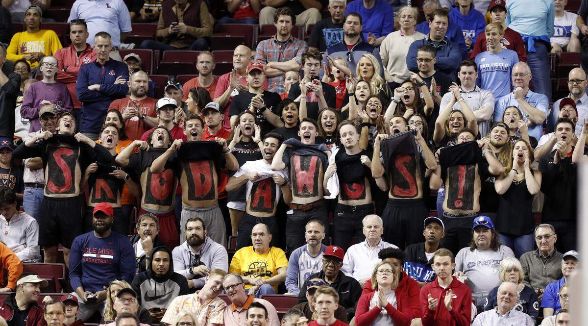 Gardner-Webb fans cheer on their team during the first half of the Runnin’ Bulldogs NCAA tournament game against Virginia Friday.