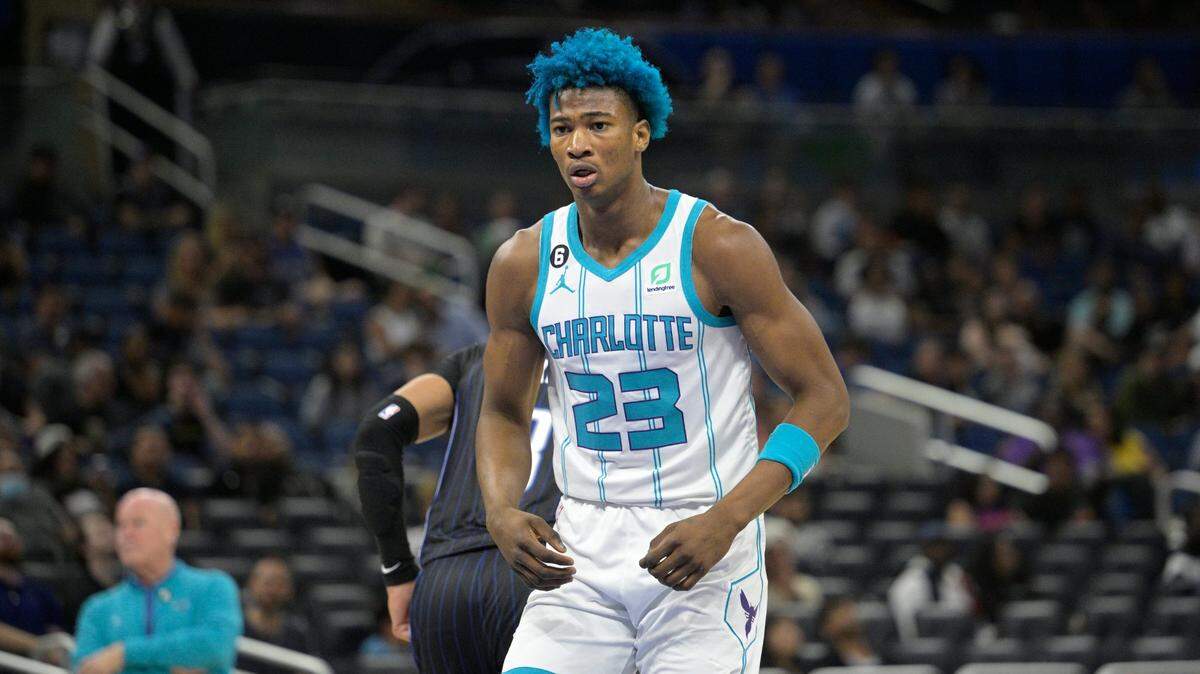 Charlotte Hornets forward Kai Jones (23) reacts after dunking during the second half of an NBA basketball game against the Orlando Magic, Friday, Oct. 28, 2022, in Orlando, Fla. (AP Photo/Phelan M. Ebenhack)