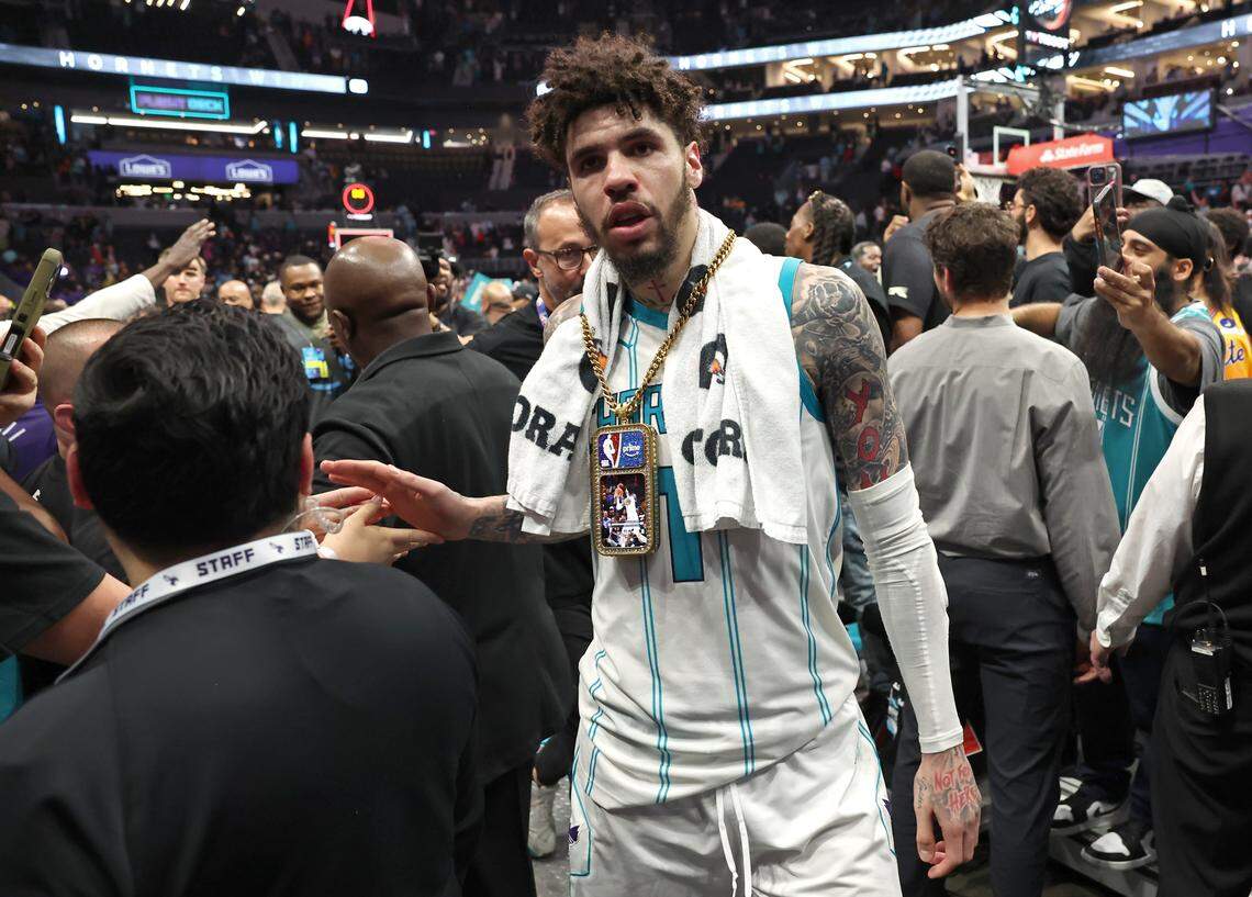 Charlotte Hornets guard LaMelo Ball is congratulated by fans following Tuesday’s win over the Miami Heat at Spectrum Center in Charlotte.