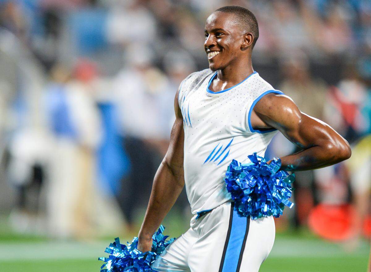 Chris Crawford strikes a pose after finishing a dance routine during the Carolina Panthers’ preseason game against the Baltimore Ravens on Aug. 21 at Bank of America Stadium.