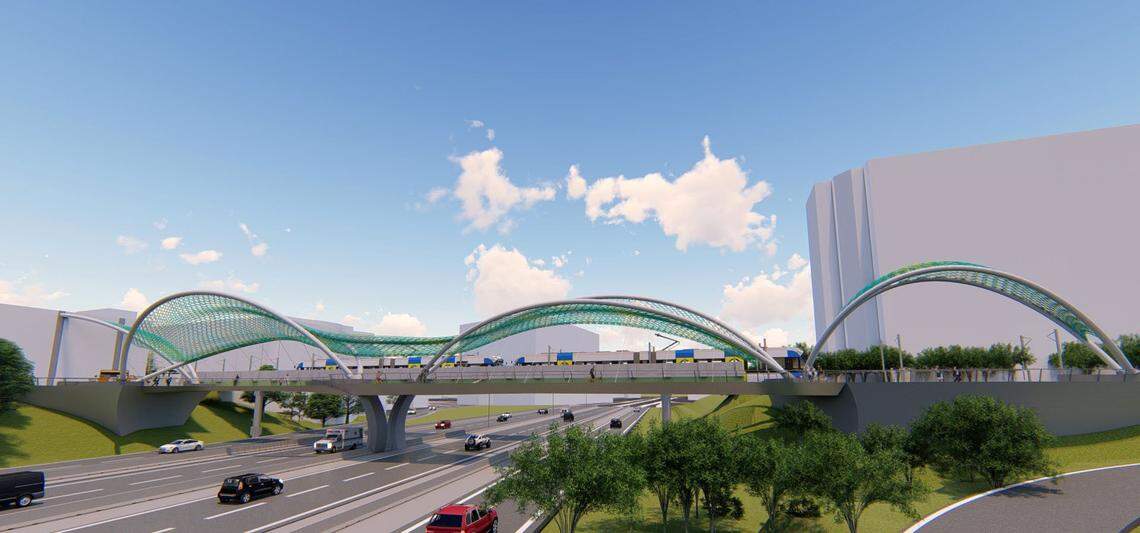 The double-span option for the Rail Trail Bridge would feature a series of curves and canopies rising about 40 feet above the platform. 