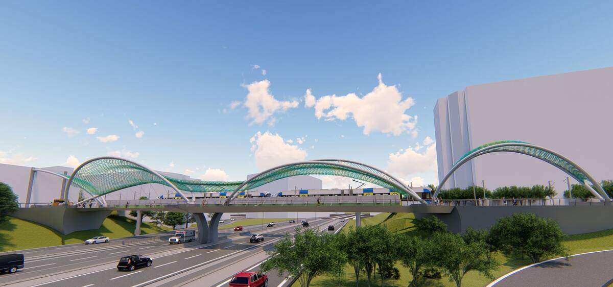 The double-span option for the Rail Trail Bridge would feature a series of curves and canopies rising about 40 feet above the platform. 