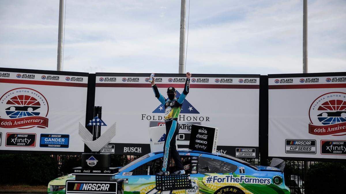 Kevin Harvick (4) celebrates after winning a NASCAR Cup Series auto race at Atlanta Motor Speedway, Sunday, June 7, 2020, in Hampton, Ga. (AP Photo/Brynn Anderson)