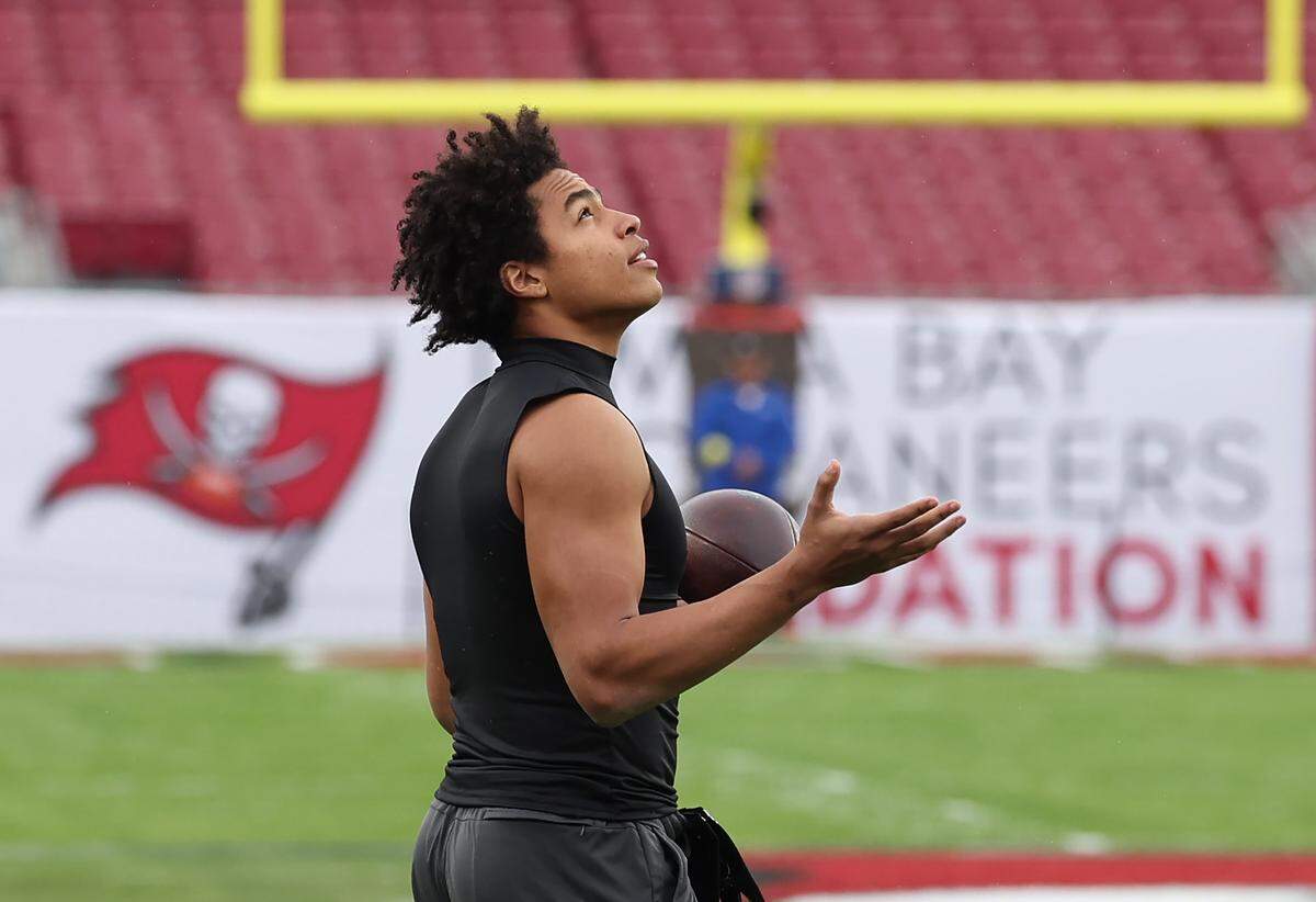 Carolina Panthers wide receiver Jalen Coker looks to the sky as rain drops begin to fall at Raymond James Stadium in Tampa, FL.on Saturday, January 3, 2026. The Panthers play the Tampa Bay Buccaneers in the team’s final regular season game.