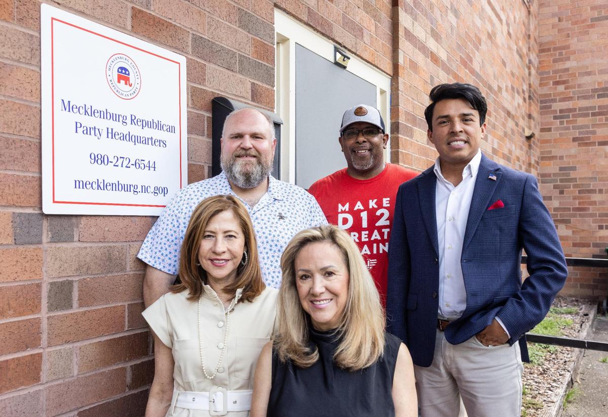 Mecklenburg GOP Chair Kyle Kirby, from left, 12th Congressional District GOP Chair Addul Ali, Communications Chair Jeffrey Baldwin, Vice Chair Maria Lena Conaway and Voter Registration Chair Alma Peters, pose for a portrait outside of the Mecklenburg GOP headquarters.