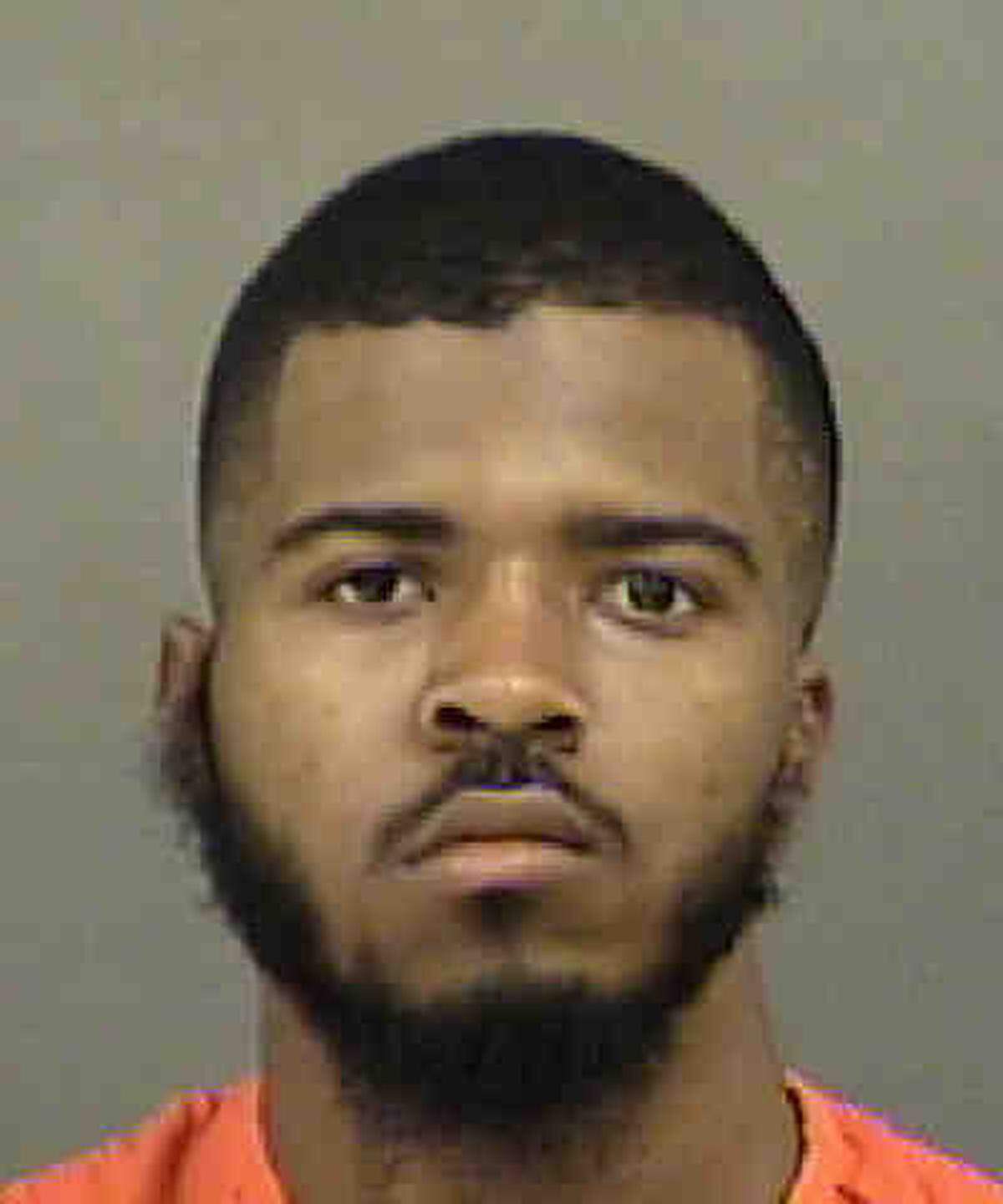 Andre Young-Johnson, 21, of Charlotte pleaded guilty to second-degree murder Thursday in the May killing of Julius Williams, 35,  which occurred in the victim's uptown apartment. The dead man's parents both spoke at Young-Johnson's plea hearing.
