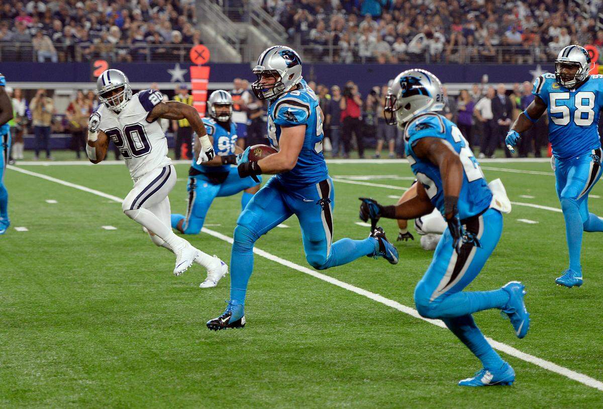 Carolina Panthers linebacker Luke Kuechly (59) takes back an interception for a pick-6 against Dallas and quarterback Tony Romo on Thanksgiving Day 2015. Kuechly is up for the Pro Football Hall of Fame this year; whether he makes it or not will be announced Feb. 5.