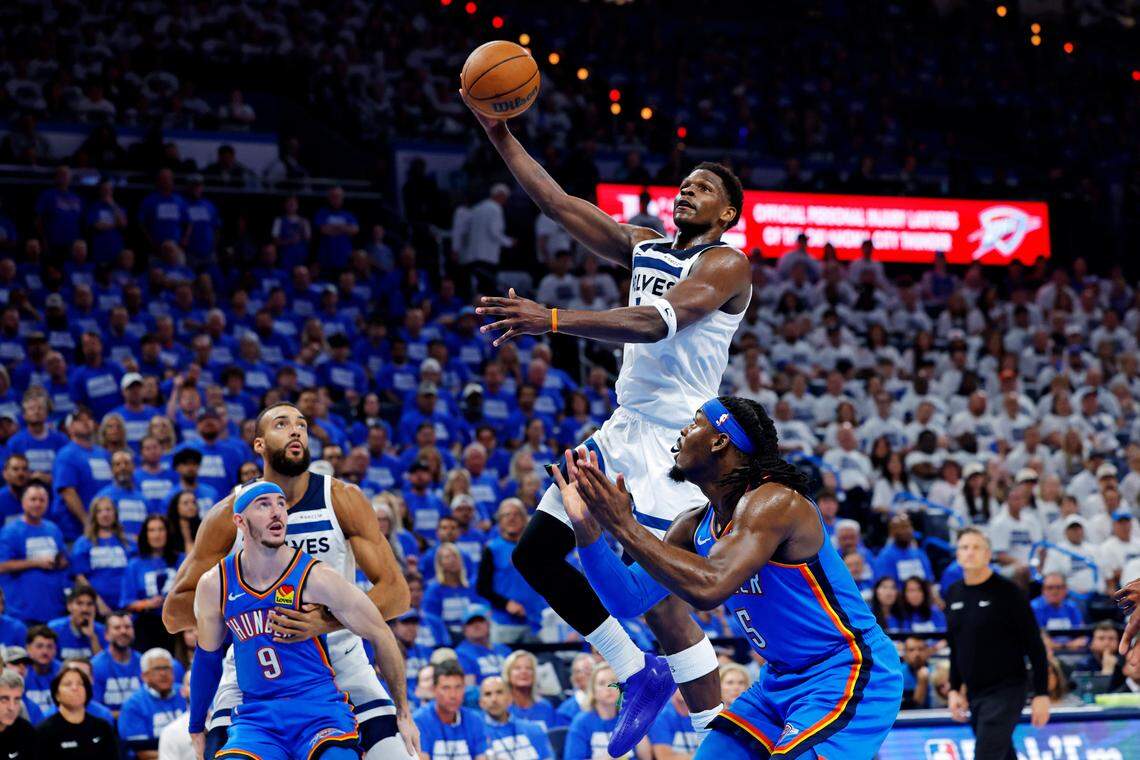 May 28, 2025; Oklahoma City, Oklahoma, USA; Minnesota Timberwolves guard Anthony Edwards (5) shoots the ball againts Oklahoma City Thunder forward Jaylin Williams (6) during the second quarter in game five of the western conference finals for the 2025 NBA Playoffs at Paycom Center. Mandatory Credit: Alonzo Adams-Imagn Images