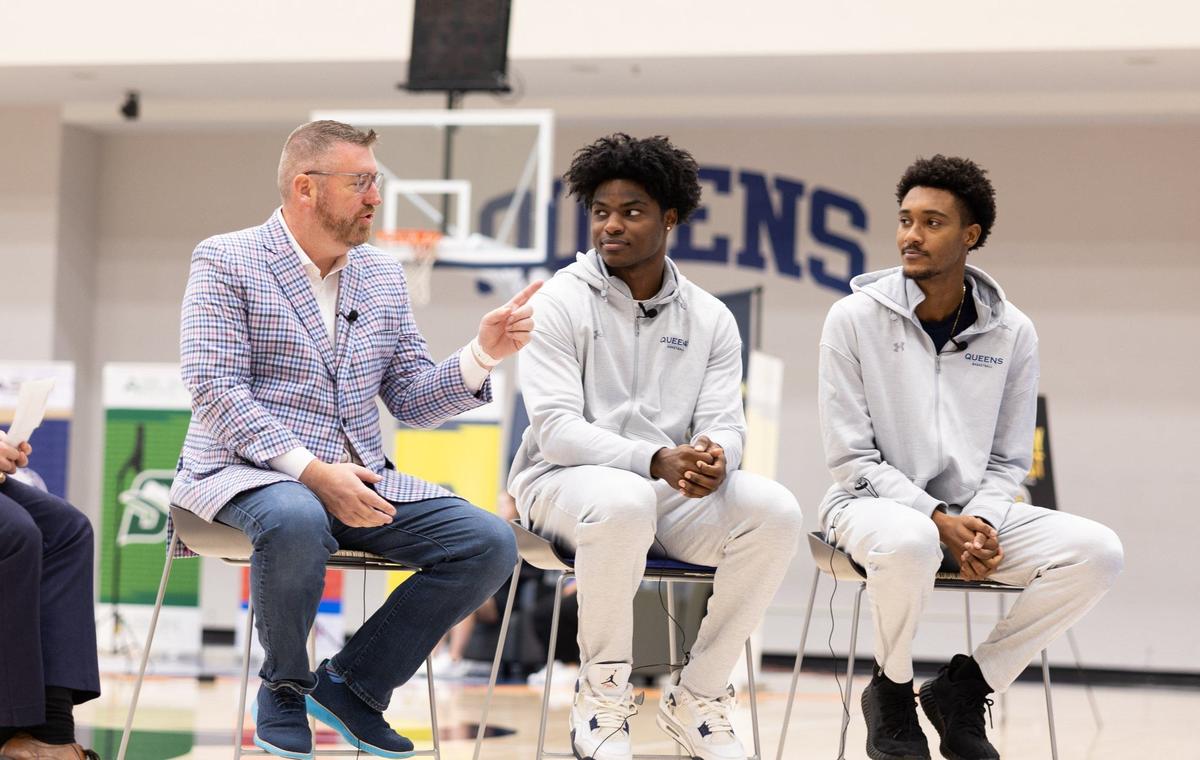 Queens basketball coach Grant Leonard and players Bryce Cash and Leo Colimerio speak during the Atlantic Sun Basketball Media Day at Queens University in Charlotte, N.C. on Monday, October 14, 2024.