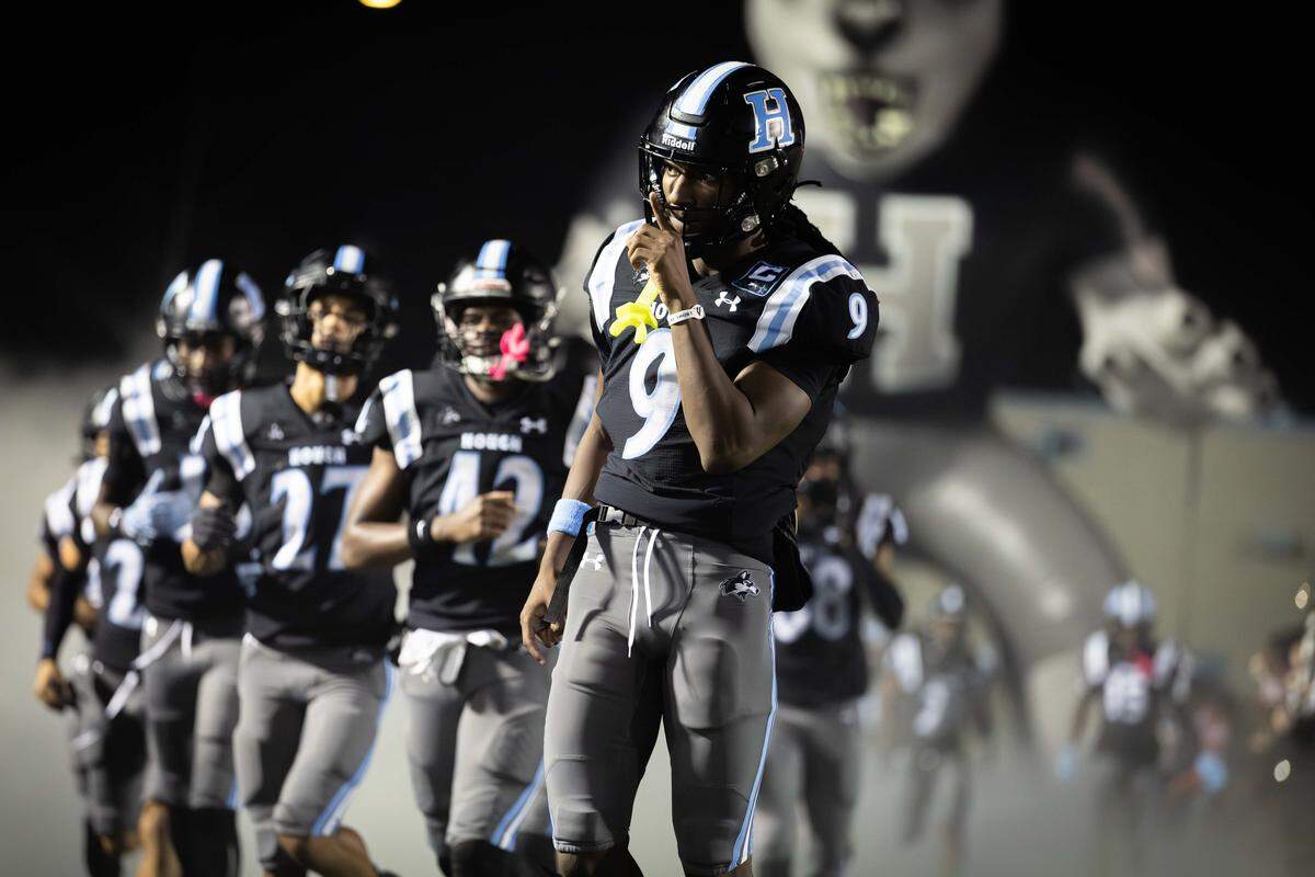 Hough senior defensive back Samari Matthews (9) takes the field ahead of the third round of the NCHSAA 8A playoffs against West Forsyth on Nov. 21, 2025.