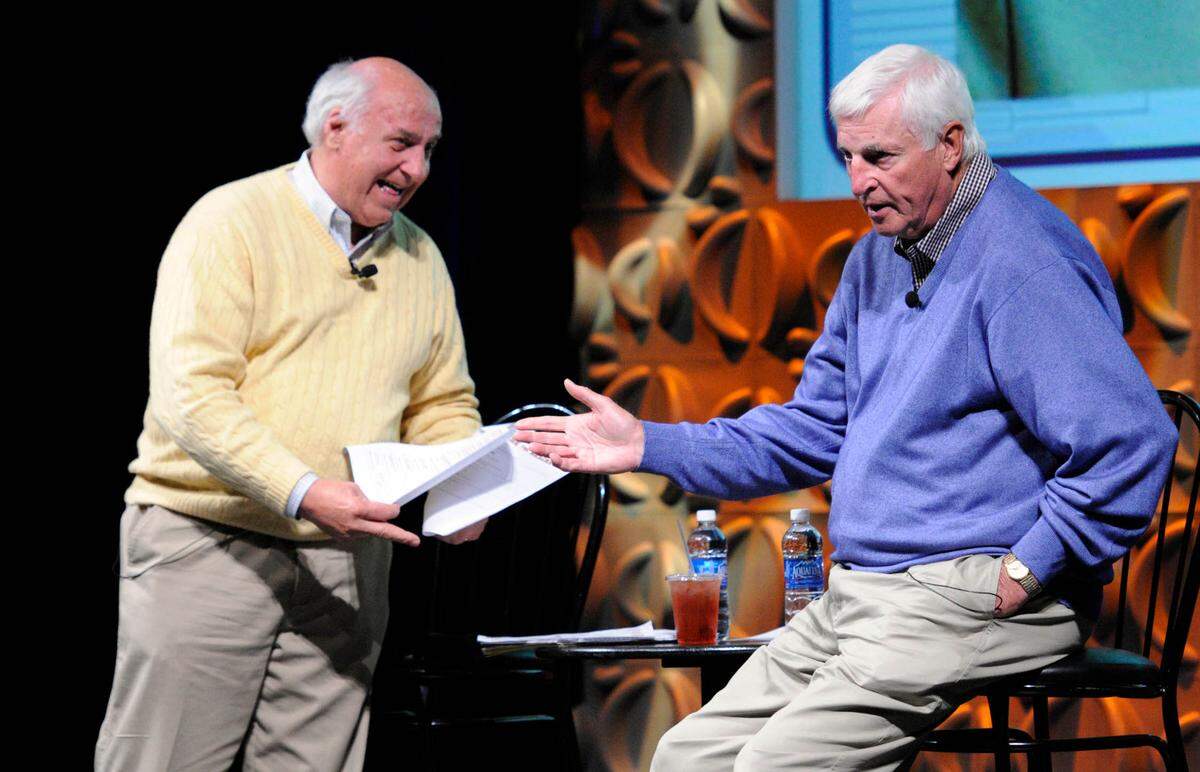 Billy Packer, left, and Bob Knight joke with each other during a 2011 event in Charlotte.