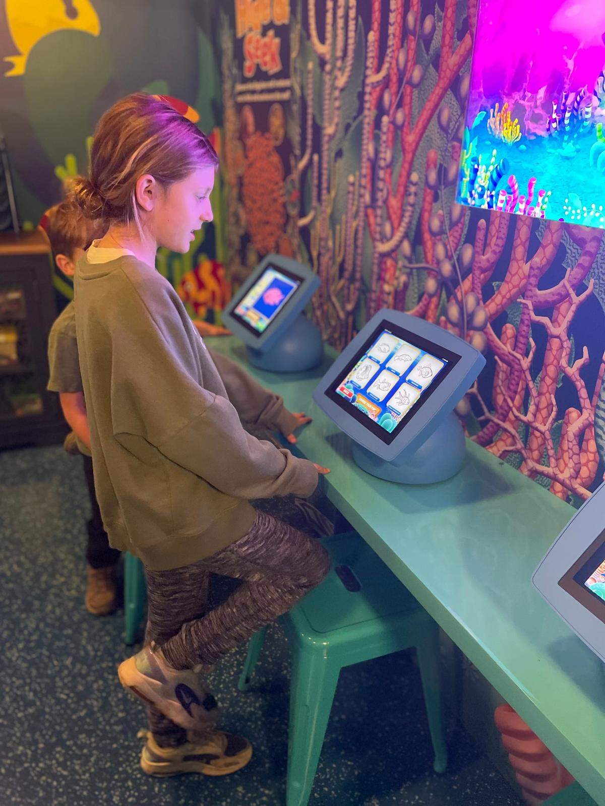 Doodle Reef is a new interactive exhibit at Sea Life Charlotte-Concord Aquarium at Concord Mills.