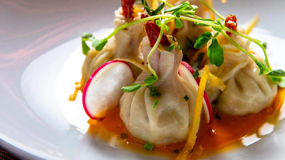 The Fox & Falcon by David Burke, a modern steakhouse at 4905 Ashley Park Lane at Sharon Square in SouthPark, opens Sept. 28. Shown here are lobster dumplings.