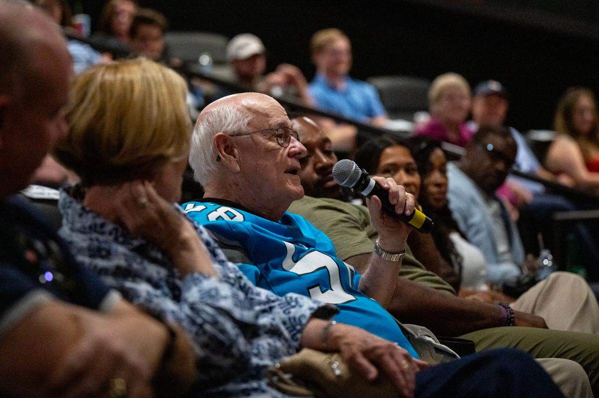 An attendee asks question during the a panel discussion following the premiere of Super Men at the Independent Picture House in Charlotte, NC on Thursday, July 24, 2025.