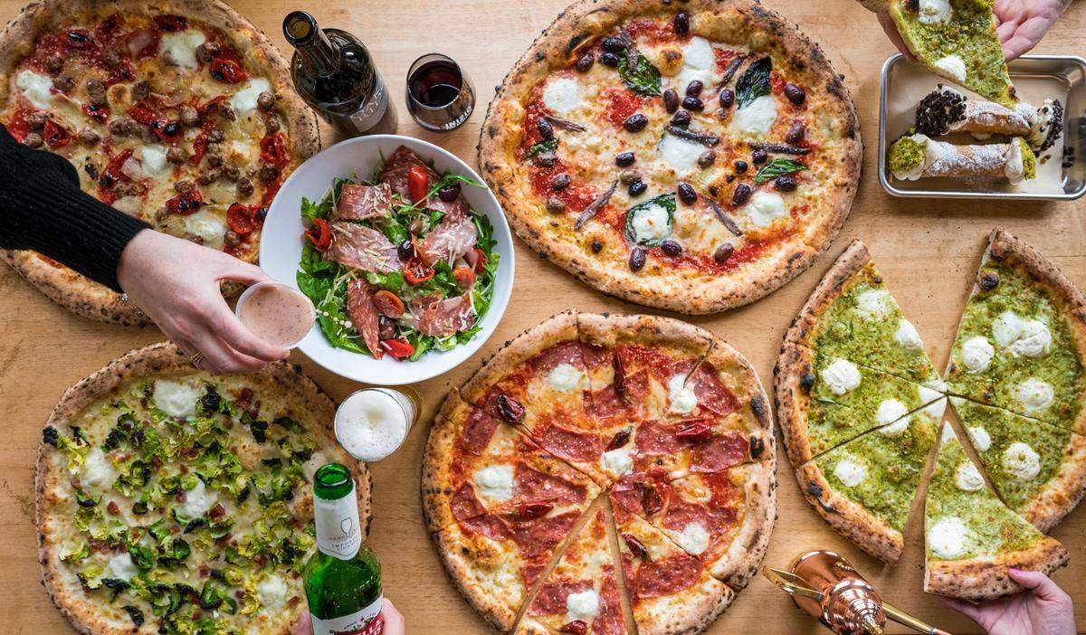 Inizio Pizza’s Neapolitan pizza is baked in a wood-fired oven.