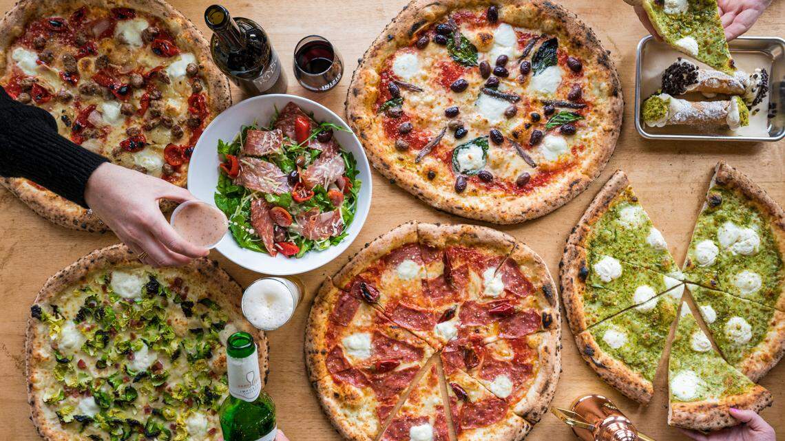 Inizio Pizza’s Neapolitan pizza is baked in a wood fired oven.