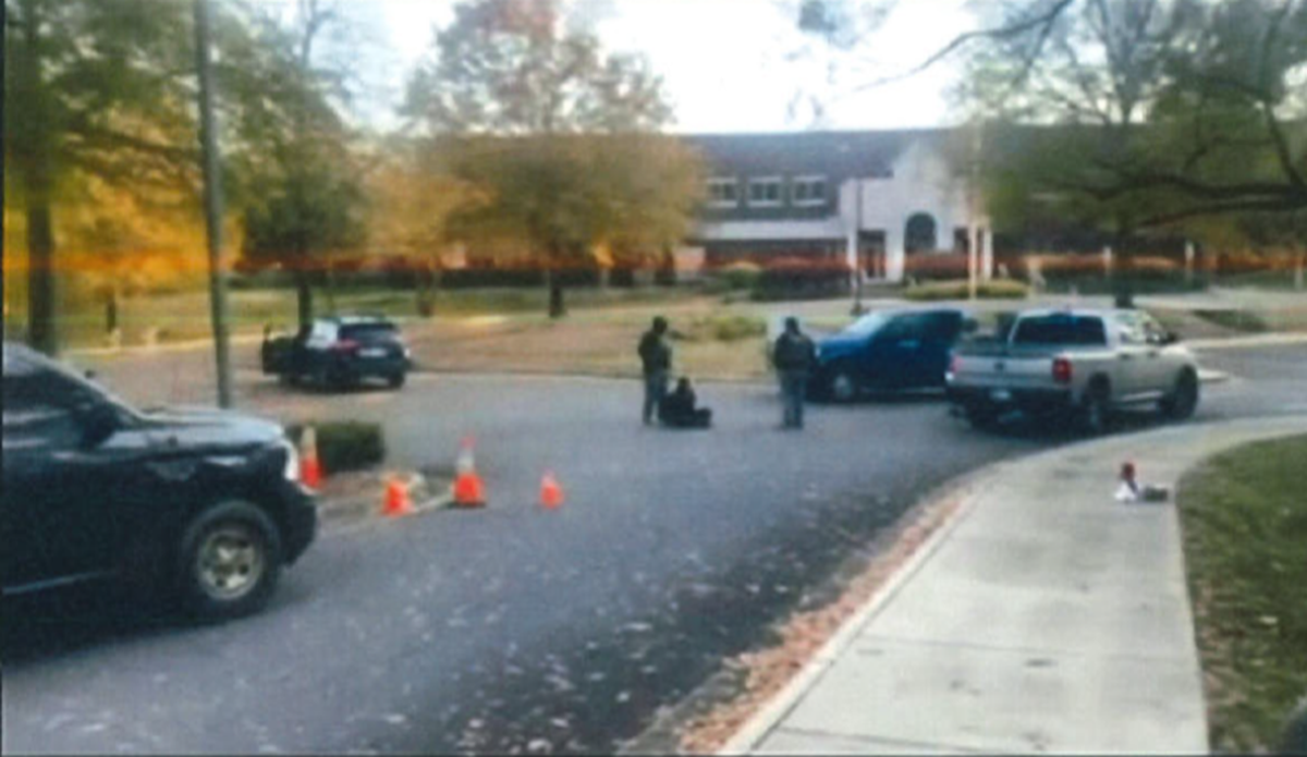 From a court filing, this picture is a screenshot from a video. It shows someone arrested at the Immigration and Customs Enforcement office on Tyvola Centre Drive. Protesters were there after Border Patrol agents came to Charlotte.