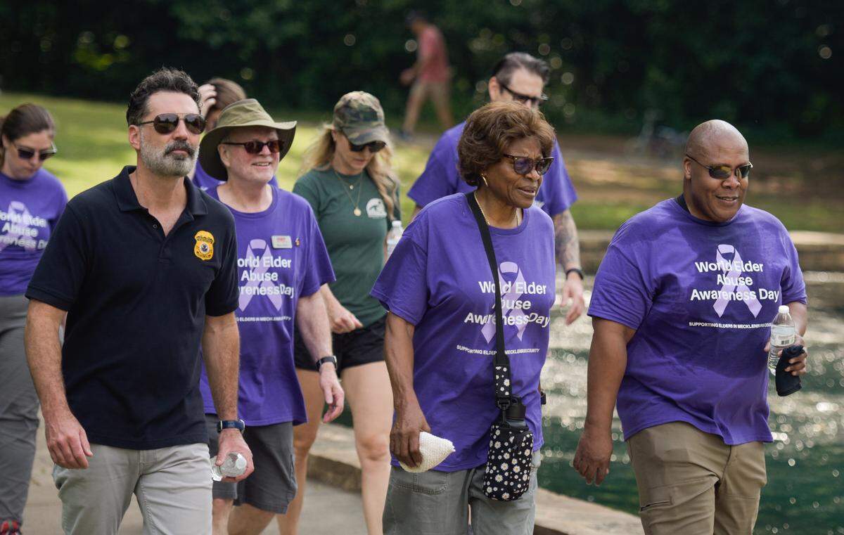 Dozens joined a walk at Freedom Park on Tuesday, June 4, 2024, in Charlotte. The elder abuse awareness walk was intended to spotlight elder abuse, neglect, and exploitation, as well as educate older adults, friends, families and caregivers on an important topic.