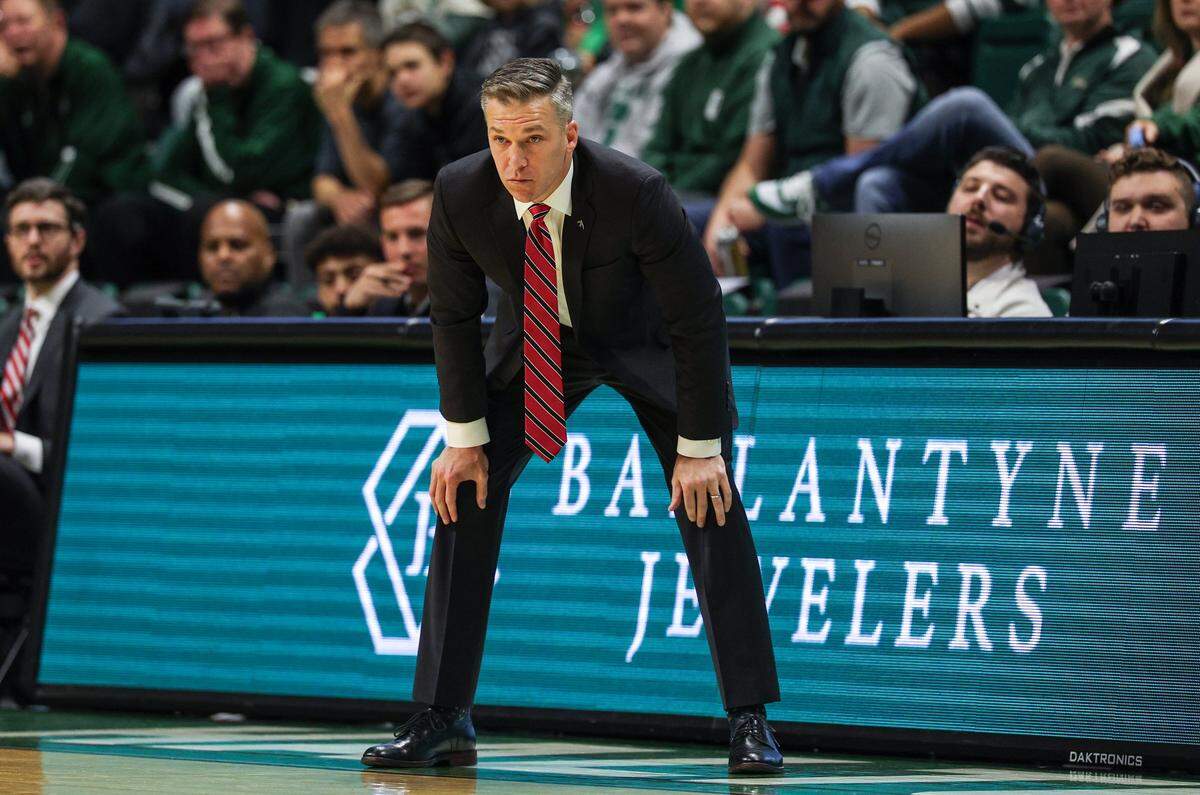 Davidson head coach Matt McKillop watches his team with hands on knees during the game against UNC Charlotte at Dale F. Halton Arena in Charlotte, NC on Tuesday, November 11, 2025.