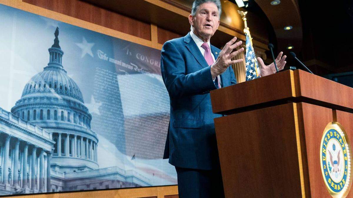 Sen. Joe Manchin, D-W.Va., speaks with reporters during a news conference on Capitol Hill, Monday, Nov. 1, 2021 in Washington.